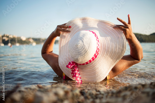 Woman relaxing on luxury beach