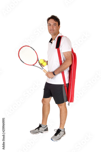 Man standing with his tennis tools, smiling © 80Feierabend