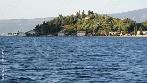 view of Lepetane - Kamenari At Bay Of Kotor, Montenegro from Ferry boat photo