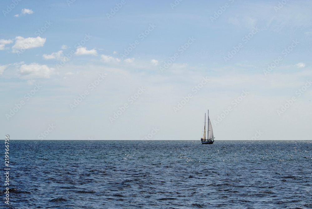 Sail Boat on the Ocean Horizon