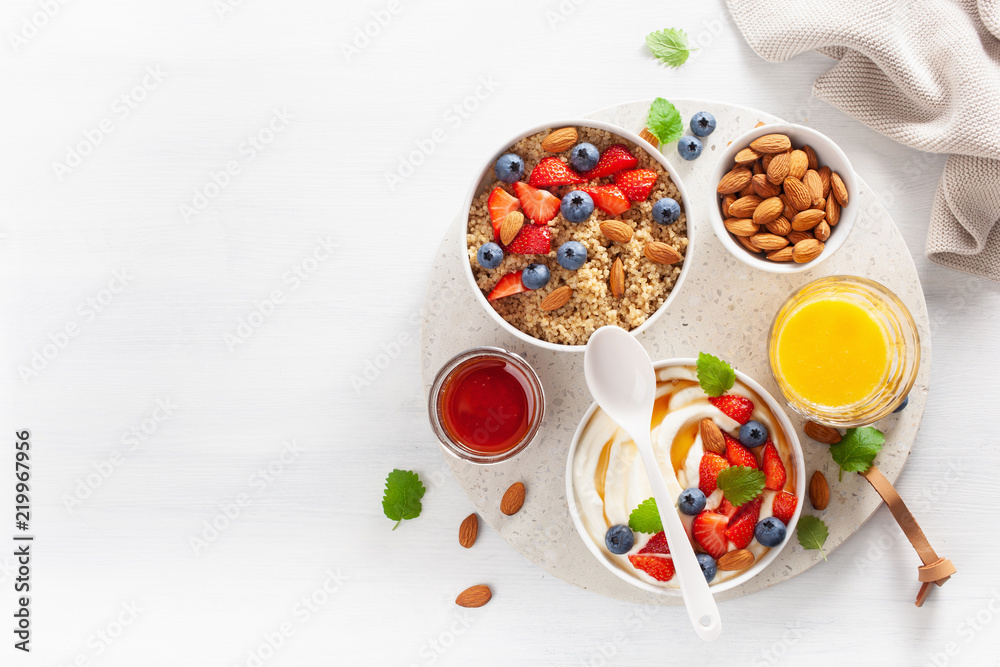 yogurt with strawberry blueberry honey almond and quinoa for breakfast yogurt with strawberry blueberry honey almond and quinoa for breakfast