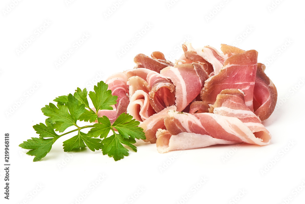 Twisted pieces of pork farmer meat or bacon with parsley, isolated on white background. Twisted pieces of pork farmer meat or bacon with parsley, isolated on white background.
