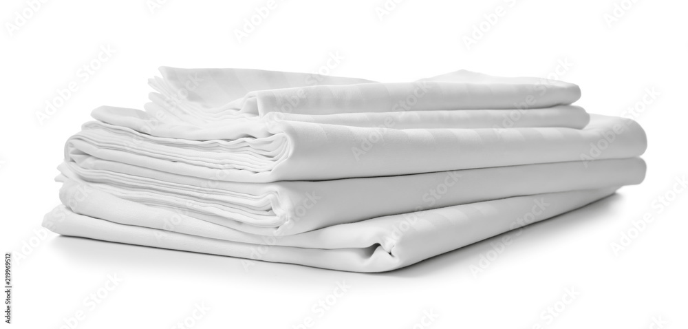 Stack of clean bed sheets on white background - obrazy, fototapety, plakaty 