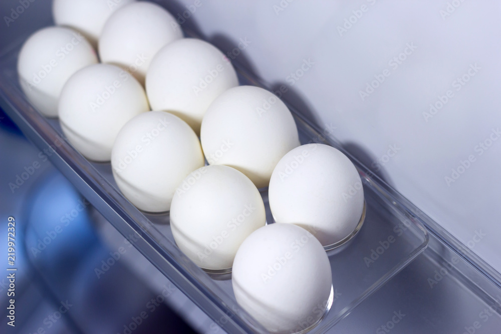 White chiken eggs in the fridge White chiken eggs in the fridge