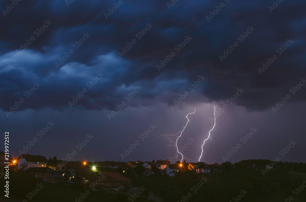 Summer thunderstorm and lightnings Summer thunderstorm and lightnings