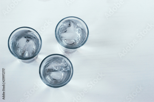 Wallpaper Mural Vodka shots with ice on a white background Torontodigital.ca