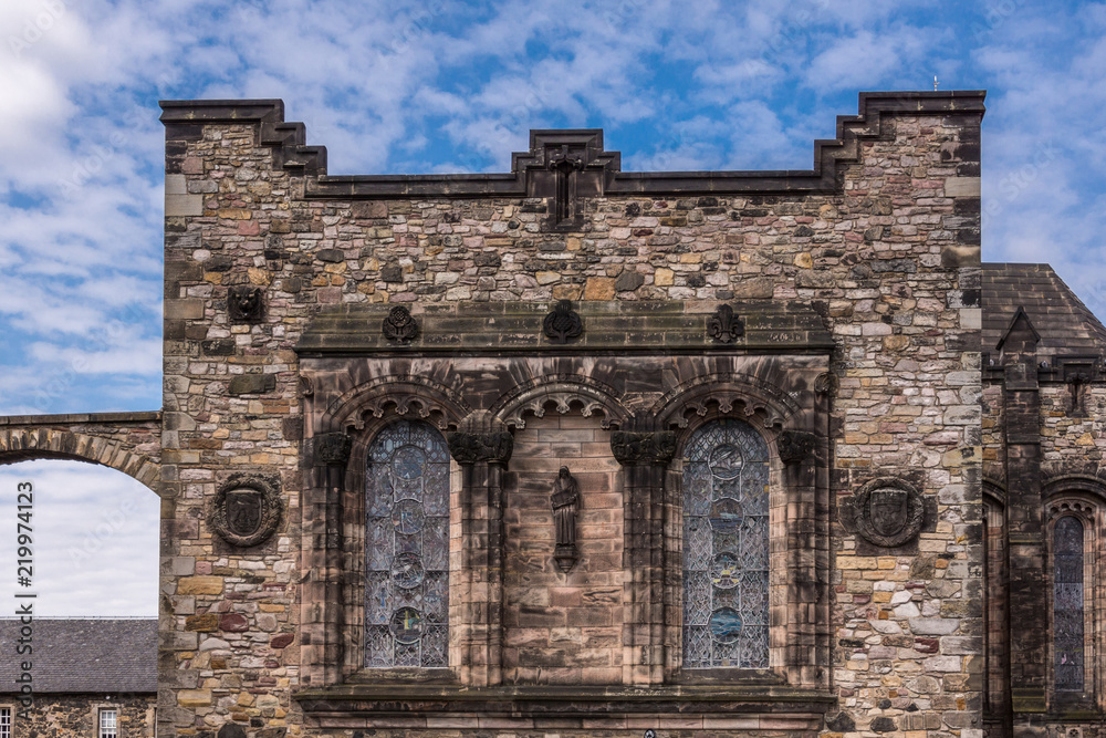Edinburgh, Scotland, UK - June 14, 2012: Brown stone facade with windows of Scottish National War Memorial at Castle. Edinburgh, Scotland, UK - June 14, 2012: Brown stone facade with windows of Scottish National War Memorial at Castle.