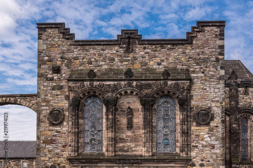 Edinburgh, Scotland, UK - June 14, 2012: Brown stone facade with windows of Scottish National War Memorial at Castle.