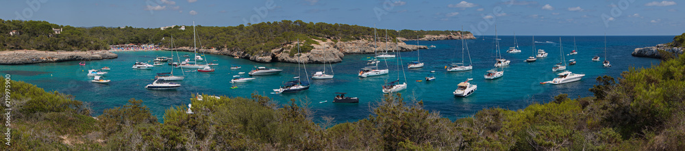 Boats in the bay of Cala Mondrago on Mallorca
