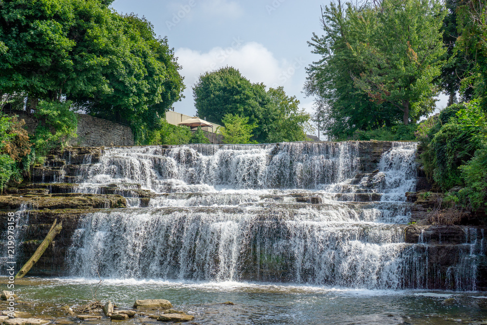 Waterfall at park in summer