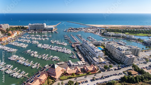 Aerial view of the bay of the marina, with luxury yachts in Vilamoura. photo