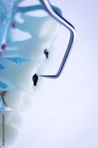 Fototapeta Naklejka Na Ścianę i Meble -  Dentist cleaning teeth