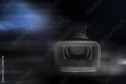 professional video camcorder in studio with blurred background