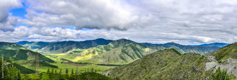 Beautiful summer panoramic landscape of valley from mountain pass Chike-Taman, Altai mountains, Russia