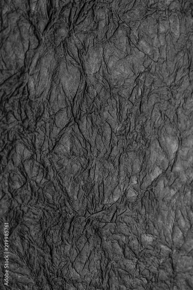 Naklejka premium black crumpled paper texture background handmade