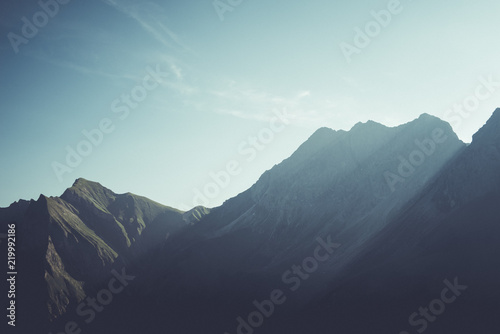 Sun shining over Bavarian Alps photo