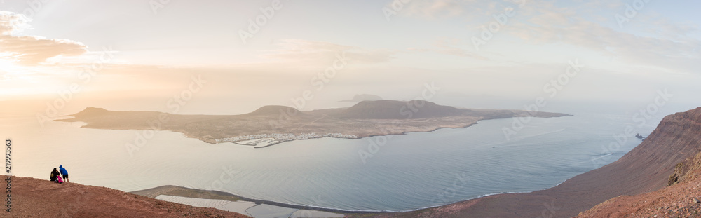 Landscape from 'Mirador del Rio' with a couple, Lanzarote, Spain
