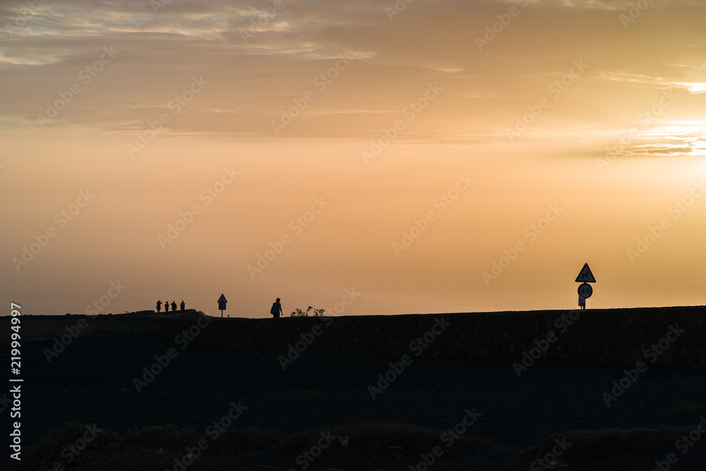 'Mirador del Rio' sunset with a woman,Lanzarote, Spain