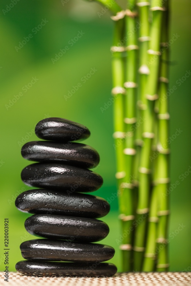 Obraz premium Balancing Pebbles with Bamboo