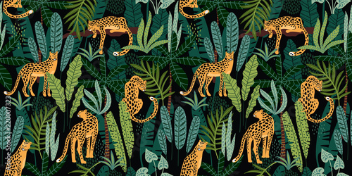 Vestor seamless pattern with leopards and tropical leaves.