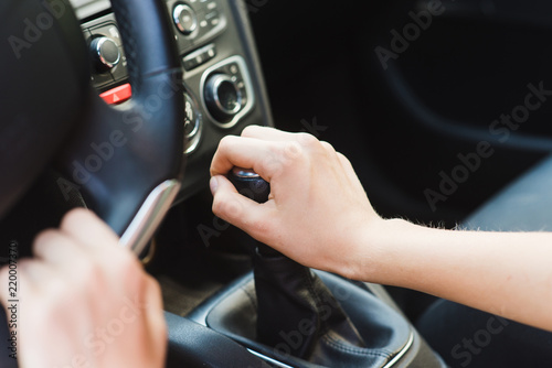 Picture of female hands and gear lever © o_lypa