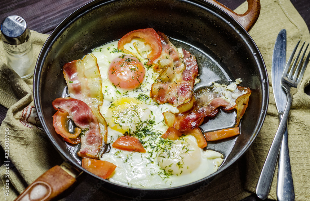 Iron pans and bacon eggs Iron pans and bacon eggs