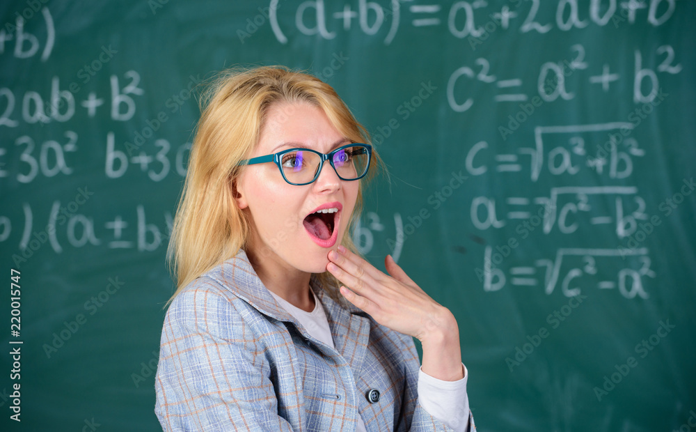 Teacher wonder about result. School education basic knowledge. Solve mathematics task. Do you know how solve that task. Woman wear eyeglasses smart teacher classroom chalkboard background, close up Teacher wonder about result. School education basic knowledge. Solve mathematics task. Do you know how solve that task. Woman wear eyeglasses smart teacher classroom chalkboard background, close up