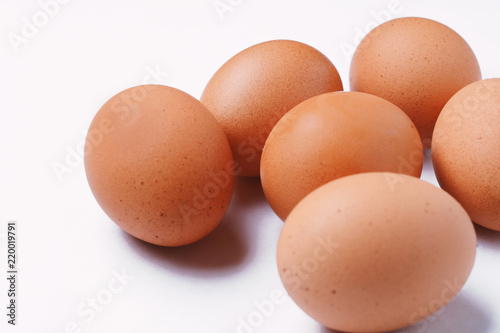 Six brown eggs