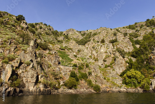 Sil Canyon, Sober (Lugo), Spain. August 25, 2018: View of a terraced vineyard at river Sil canyon and Ribeira Sacra valley in Galicia. The area is famous for its scenery and terraced vineyards.