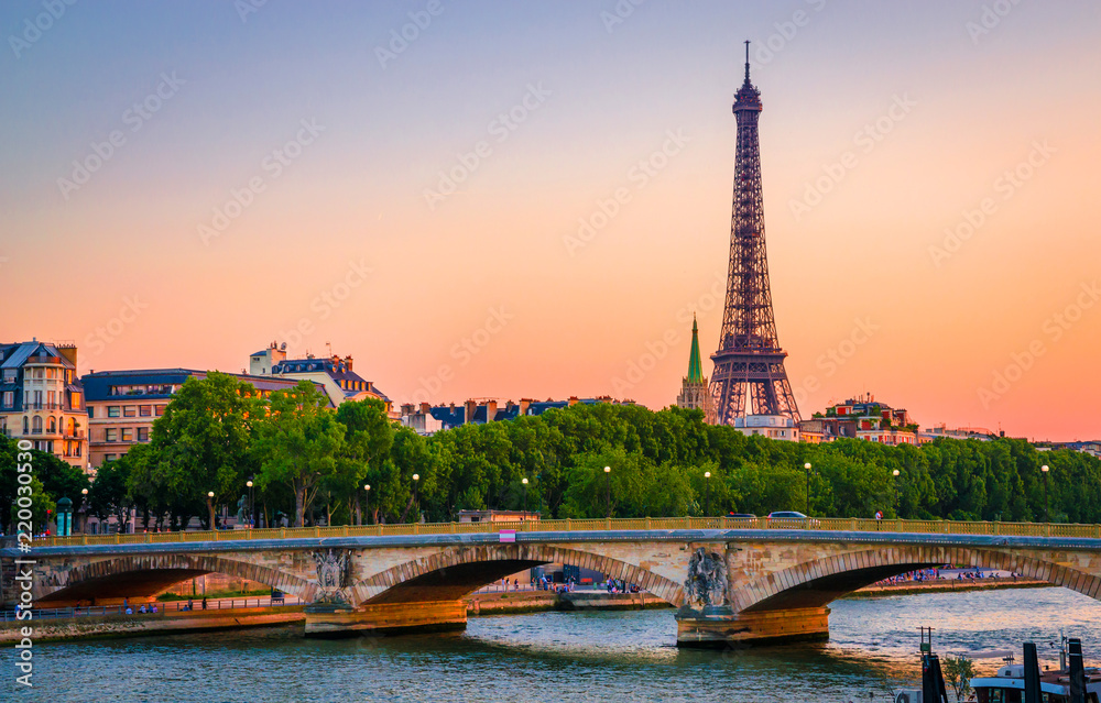 Sunset view of Eiffel Tower and river Seine in Paris, France.