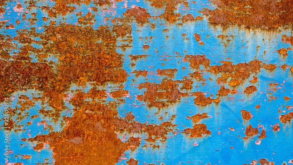 metallic blue wall with rust