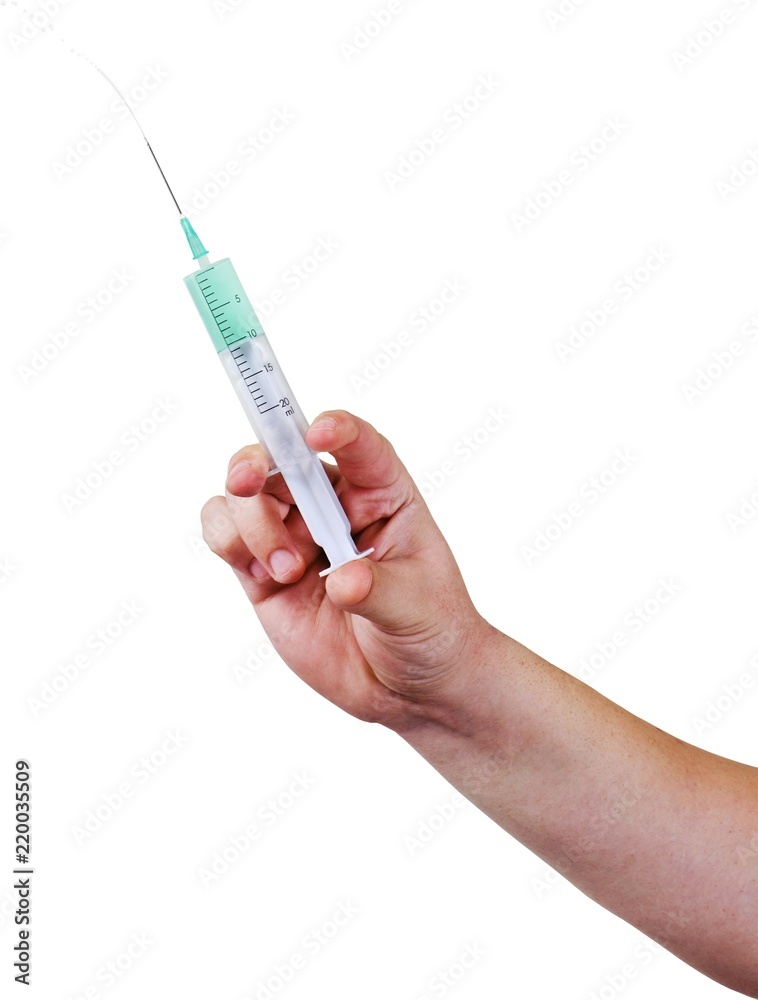 hand holding a syringe hand holding a syringe