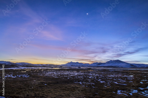 Fototapeta Naklejka Na Ścianę i Meble -  The great views of Lauca National Park landscapes with its amazing reflections over the Cotacotani Lagoons during a crescent moon cycle, Arica, Chile