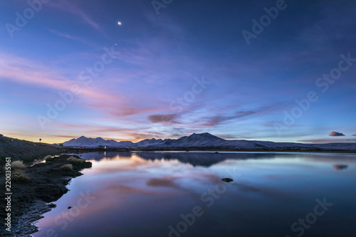The great views of Lauca National Park landscapes with its amazing reflections over the Cotacotani Lagoons during a crescent moon cycle, Arica, Chile
