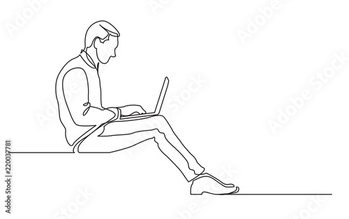 continuous line drawing of office worker sitting working on laptop computer
