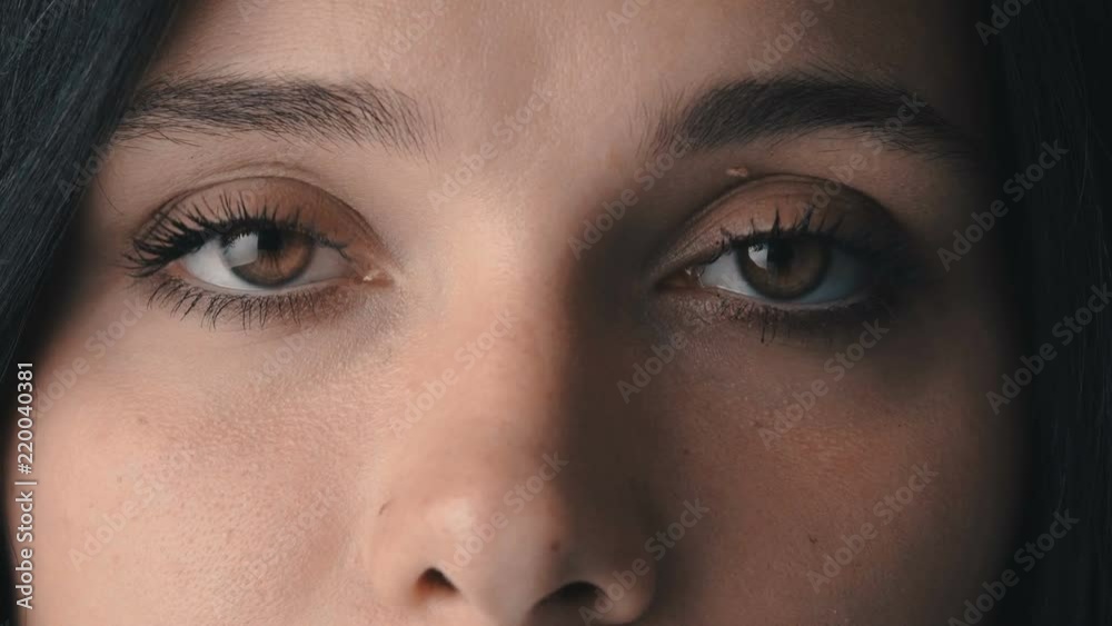 Beauty Macro Close-up Brown woman's eyes blinking