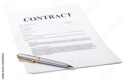 Ballpoint pen on top of a contract photo