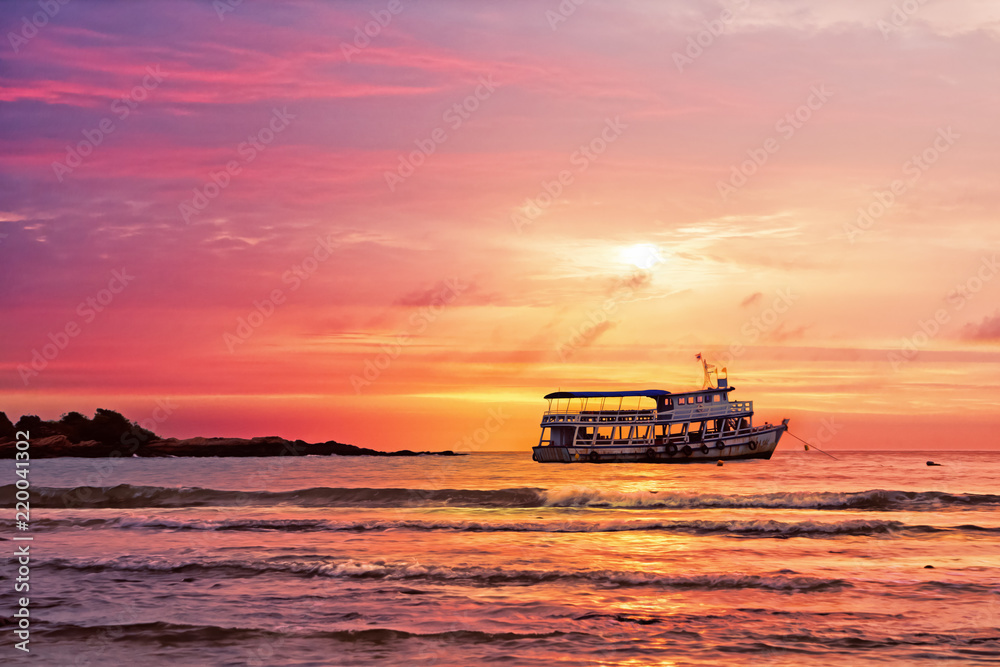 Seascape scenery of sunrise sky with wooden boat at Samed island rayong district Thailand Seascape scenery of sunrise sky with wooden boat at Samed island rayong district Thailand