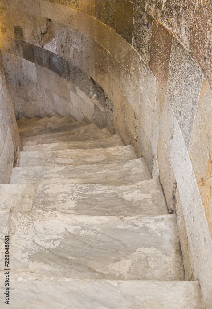 A narrow marble staircase in the leaning tower A narrow marble staircase in the leaning tower