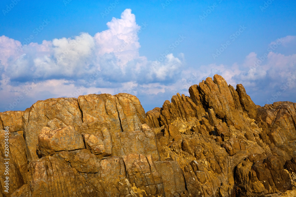 Fototapeta premium Rocks and sky with beautiful clouds.