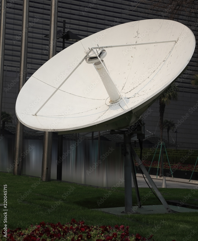 Satellite dish space technology receivers with modern buildings backgrounds