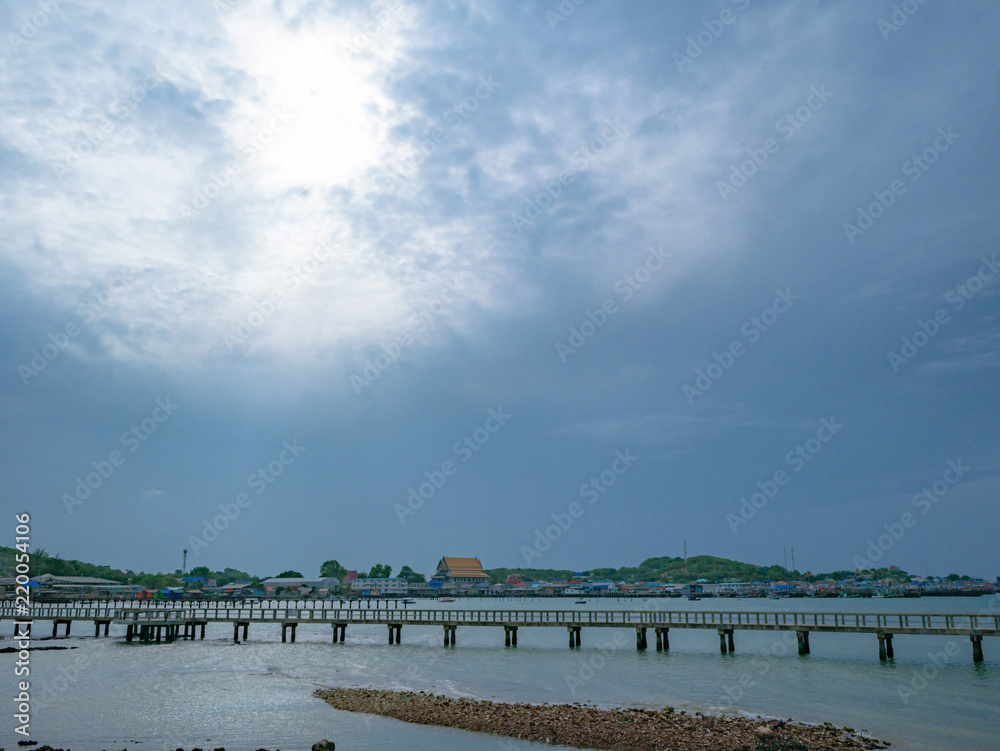 Fototapeta premium Concrete bridges on the ocean with idyllic ocean and rocky beach in vacation time