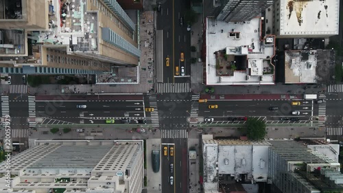 aerial flying over cars driving at intersection in Midtown Manhattan New York City NYC photo