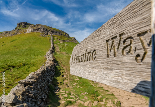 Sign: Pennine Way - seen in the Yorkshire Dales between Halton Gill and Horton in Ribblesdale with the Pen-Y-Ghent in the background, North Yorkshire, England, UK photo