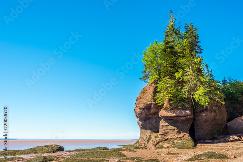 During the tide in the Bay of Fundy, rock formations are uncovered - Canada