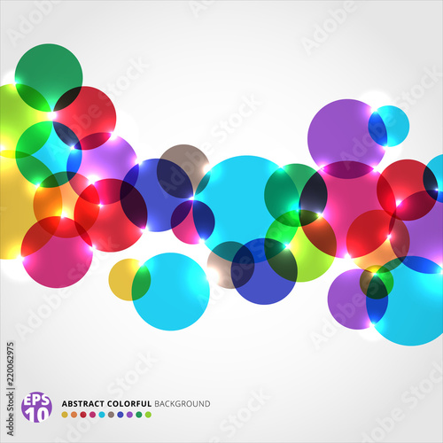 Abstract colorful circles with light glowing on white background.