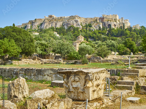 Konstfotografi Ruins of Odeon of Agrippa, located at the Ancient Agora of Athens with Church of the Holy Apostles and the north slope of the Athenian Acropolis in background