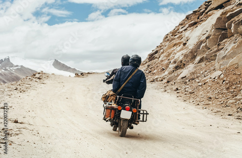 Motobike travelers ride in indian Himalaya roads photo