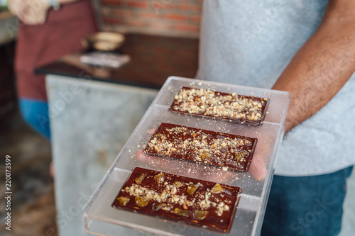 Ingredients to make chocolate: cocoa beans, milk, nuts, sugar, cocoa powder