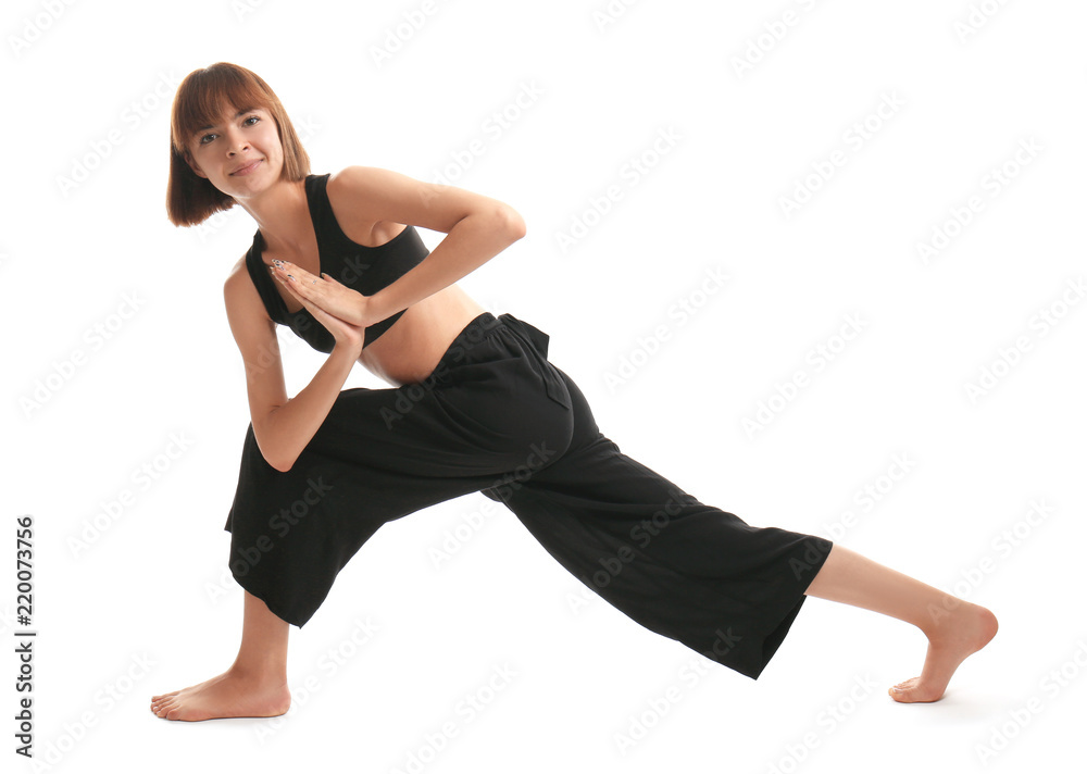 Sporty woman practicing yoga on white background Sporty woman practicing yoga on white background